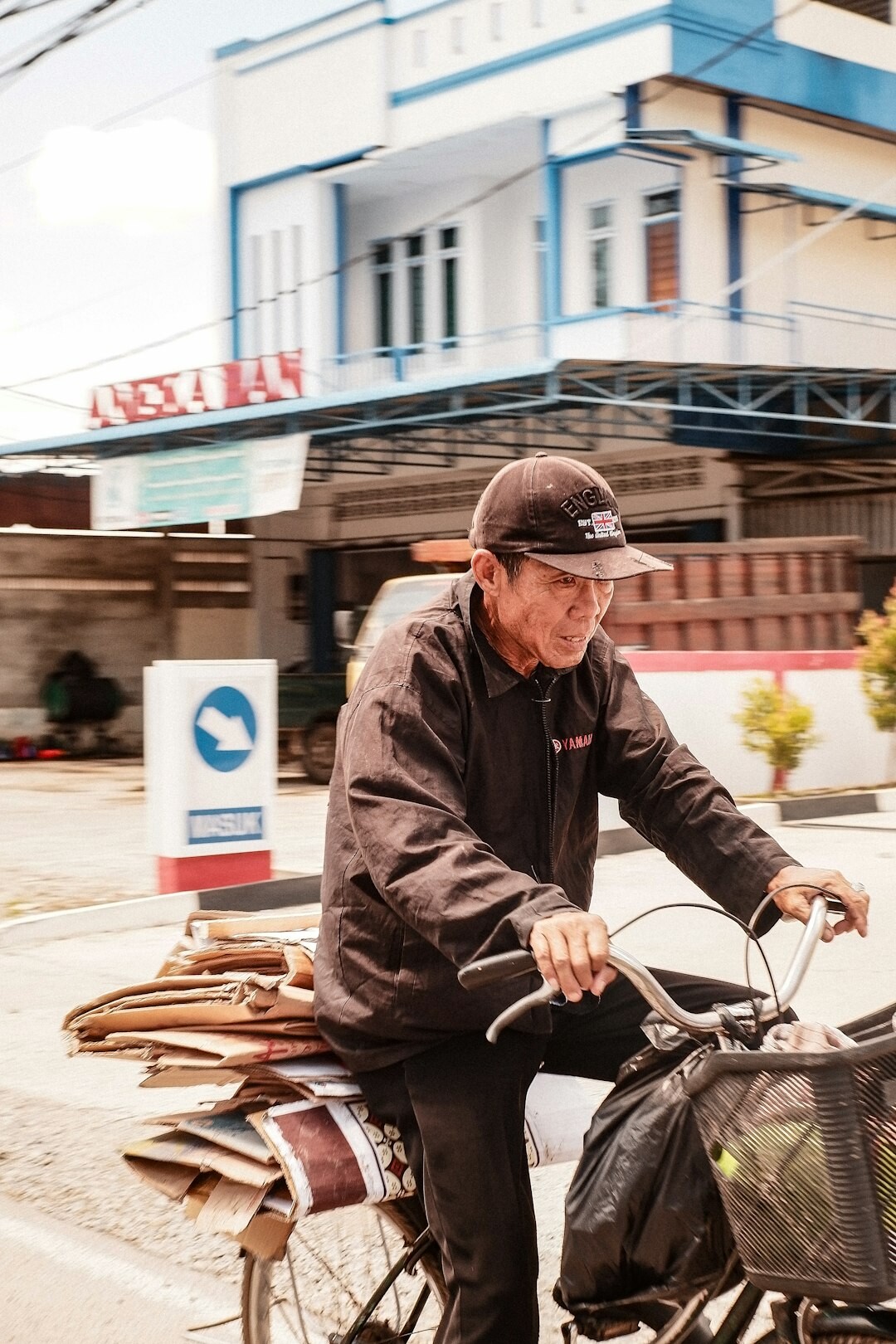 elderly man on bicycle