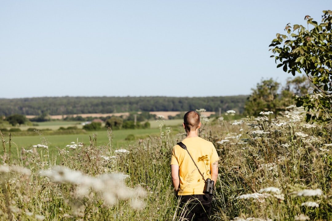 young photographer in countryside
